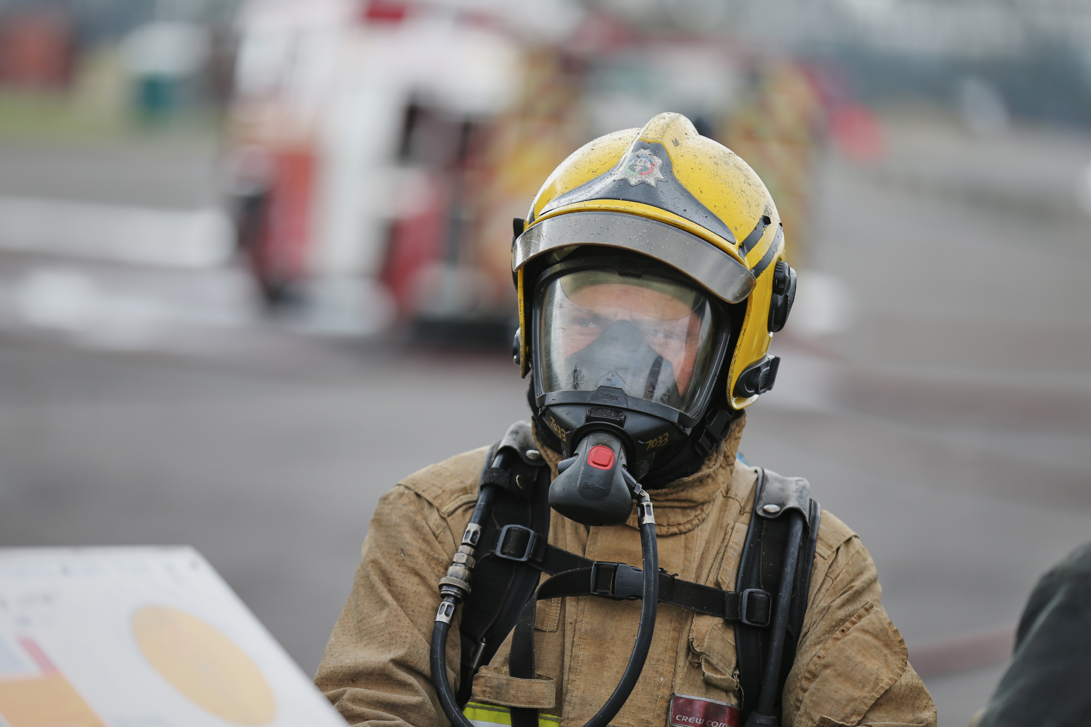 Firefighter with breathing apparatus